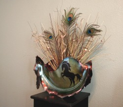 Raku sculpture with floral arrangement