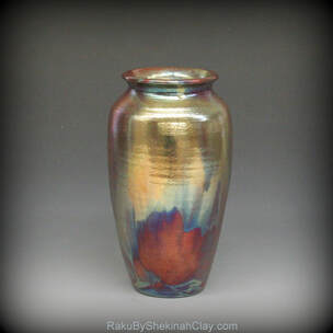 RAKU vase in blue copper metallic glazes